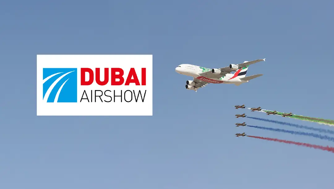 The Dubai Airshow logo, with an Airbus A380 airplane flying overhead and a group of aerobatic planes performing stunts below