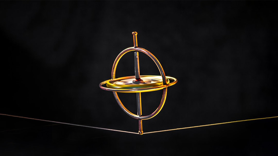 Toy gyroscope balancing on a line